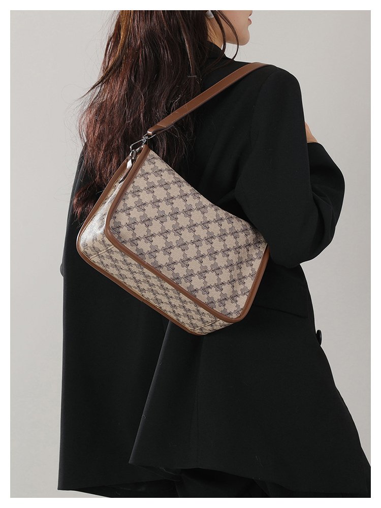 Designer Monogram Canvas Crossbody Bag – Luxury Half-Moon Saddle Bag